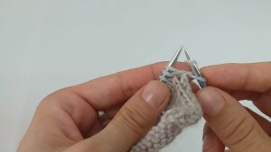 Casting off on knitting yarn over